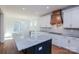Modern kitchen featuring a large island with granite countertops, white cabinets, and stainless steel appliances at Tbd Boomer Ct # 8, Statesville, NC 28677