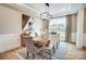 Formal dining room with modern light fixture, large window, and hardwood floors at Tbd Boomer Ct # 9, Statesville, NC 28677