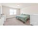 Bright bedroom featuring new carpet, natural light, and ample space at 1043 Kalli Dr, Matthews, NC 28104