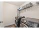 Convenient laundry room with new appliances and shelving at 1043 Kalli Dr, Matthews, NC 28104