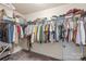 Spacious walk-in closet featuring ample storage with shelves and clothing racks for organizing personal belongings at 1043 Kalli Dr, Matthews, NC 28104