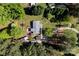An aerial view showing the house sitting amongst lush greenery and trees at 1060 Sierra Rd, York, SC 29745