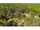 Aerial view of home nestled in lush greenery with mature trees at 1060 Sierra Rd, York, SC 29745