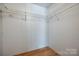 Walk-in closet with wood-look flooring and wire shelving provides ample storage space at 1060 Sierra Rd, York, SC 29745