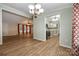 Open floorplan featuring dining room area flowing into the living room and adjacent to the kitchen at 1060 Sierra Rd, York, SC 29745