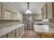 Well-equipped kitchen with stainless steel refrigerator, ample counter space, and abundant storage at 1060 Sierra Rd, York, SC 29745