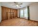 Cozy living room features wood paneled accent wall and bright natural light at 1060 Sierra Rd, York, SC 29745