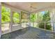 Relax on the screened porch with views of the lush, green backyard at 1060 Sierra Rd, York, SC 29745