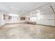 Large basement features a concrete floor and exposed ceiling, ideal for storage or workshop at 111 Pine Grove Church Rd, Concord, NC 28025