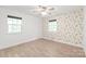 Empty bedroom with wallpaper, featuring natural light and ample space, perfect for relaxation at 111 Pine Grove Church Rd, Concord, NC 28025