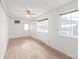 Bright and airy bedroom features natural light, with hardwood floors and a ceiling fan at 111 Pine Grove Church Rd, Concord, NC 28025