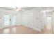 Bright bedroom with natural light and double doors leading to outdoor space at 111 Pine Grove Church Rd, Concord, NC 28025