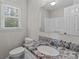 Bathroom featuring granite countertops and a vanity at 1228 Swift Rd, Oakboro, NC 28129