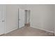 Bedroom with carpet and neutral wall color at 1228 Swift Rd, Oakboro, NC 28129