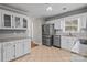 Spacious kitchen with stainless steel appliances and tiled floors at 1228 Swift Rd, Oakboro, NC 28129