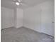A bright, clean bedroom with gray carpet and a ceiling fan at 1241 Pitts Rd, Chester, SC 29706
