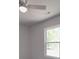 Well-lit bedroom featuring a modern ceiling fan and a bright window, creating a serene and comfortable atmosphere at 1241 Pitts Rd, Chester, SC 29706