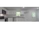 Well-lit kitchen with granite countertops, white cabinets, and stainless steel appliances at 1241 Pitts Rd, Chester, SC 29706