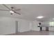 Open-concept living space featuring neutral paint, ceiling fan, and modern light fixtures at 1241 Pitts Rd, Chester, SC 29706
