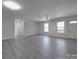 Large, light-filled living room features hard flooring and a ceiling fan at 1241 Pitts Rd, Chester, SC 29706