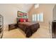 Bedroom with an angled ceiling, carpet, and a ceiling fan at 125 Swayne Dr, Mooresville, NC 28117