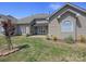 Home exterior featuring a well-kept lawn and patio at 126 Dairy Farm Rd, Mooresville, NC 28115
