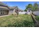 Well-maintained backyard with a shed and a charming picket fence at 126 Dairy Farm Rd, Mooresville, NC 28115