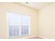 Light-filled bedroom featuring a large window with blinds at 126 Dairy Farm Rd, Mooresville, NC 28115