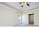 Spacious bedroom with a ceiling fan, neutral color palette, and an abundance of natural light at 126 Dairy Farm Rd, Mooresville, NC 28115
