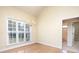 Bright dining area with wood floors, chandelier, and large window offering natural light at 126 Dairy Farm Rd, Mooresville, NC 28115