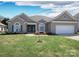 Charming single-story home with well-manicured lawn, blue shutters, and inviting curb appeal at 126 Dairy Farm Rd, Mooresville, NC 28115