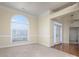 Bright living room featuring a large window, neutral carpet, and ample natural light at 126 Dairy Farm Rd, Mooresville, NC 28115