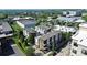Aerial view highlighting a set of modern townhouses surrounded by lush greenery and neighborhood streets at 1416 S Church St, Charlotte, NC 28203