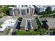Aerial shot of modern townhouses surrounded by landscaping, adjacent to parking and commercial buildings at 1416 S Church St, Charlotte, NC 28203