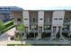 Modern townhome exteriors with multiple balconies, street view, attractive landscaping, and appealing design at 1416 S Church St, Charlotte, NC 28203