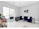 Bright living room featuring a sliding glass door to a patio and comfortable seating area at 1416 S Church St, Charlotte, NC 28203