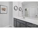 Modern bathroom featuring a sleek vanity, clean lines, and a well-lit mirror at 164 Riverstone Dr, Davidson, NC 28036