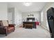 This spacious bedroom has neutral walls and flooring with large bed, chair, and furnishings at 164 Riverstone Dr, Davidson, NC 28036