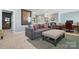 Relaxing living room area featuring comfortable seating and stylish decor, ideal for entertaining at 164 Riverstone Dr, Davidson, NC 28036