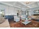 Open-concept living space with a seamless transition from the living area to the modern kitchen at 164 Riverstone Dr, Davidson, NC 28036