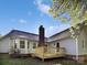 Back of house featuring a deck and lots of outdoor space at 1727 Running Brook Rd, Charlotte, NC 28214