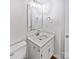 Bathroom featuring modern fixtures, a toilet, and a vanity with ample storage space at 1727 Running Brook Rd, Charlotte, NC 28214