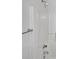 Clean shower stall with white walls, a shower head, and a towel bar at 1727 Running Brook Rd, Charlotte, NC 28214