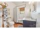 Cozy bathroom with natural light, updated fixtures, and a shower-tub combo at 2221 Commonwealth Ave, Charlotte, NC 28205