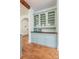 Kitchen area featuring light blue cabinets and hardwood floors at 2221 Commonwealth Ave, Charlotte, NC 28205