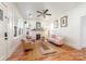 Bright living room with hardwood floors, fireplace, and comfortable seating at 2221 Commonwealth Ave, Charlotte, NC 28205