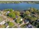 Gorgeous aerial view of waterfront community with lush trees and serene water views at 235 Commodore Loop, Mooresville, NC 28117