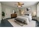 Relaxing bedroom with blue floors, a king-size bed, and a classic dresser at 2646 Jacobs Rd, Gastonia, NC 28054
