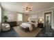 Serene bedroom with blue floors, neutral walls, and a comfortable king-size bed at 2646 Jacobs Rd, Gastonia, NC 28054