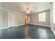 Large bedroom with painted wood floors and two closets at 2646 Jacobs Rd, Gastonia, NC 28054